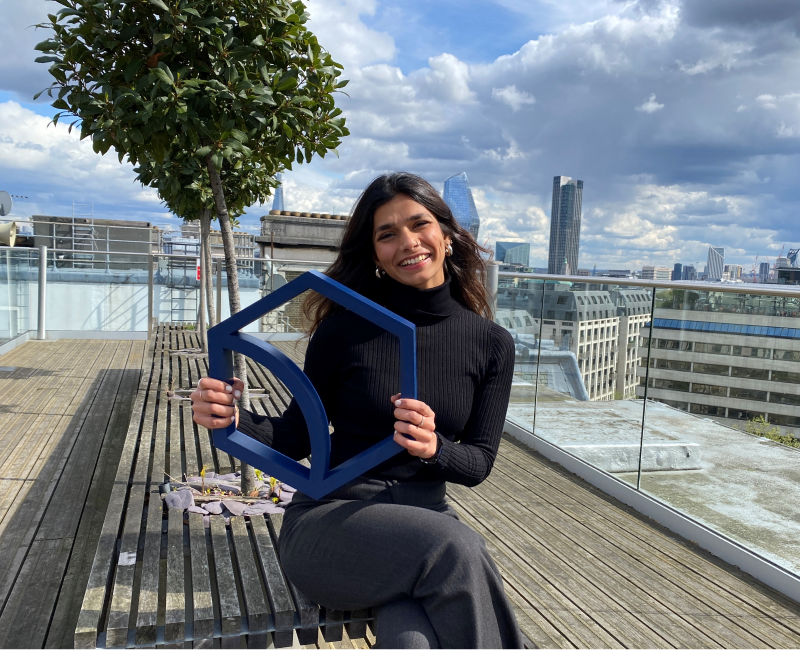 Kashish with Curve logo outside